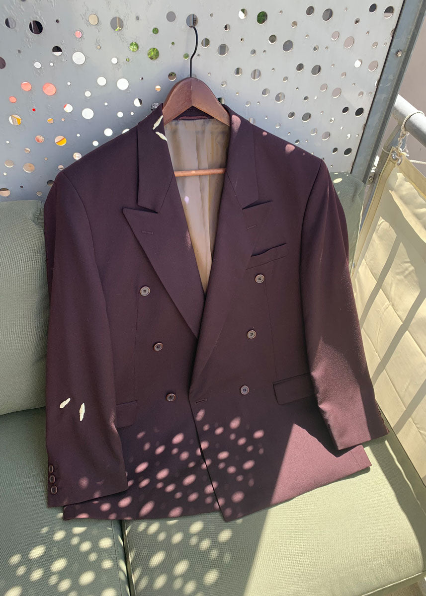 blazer from the front on a hanger